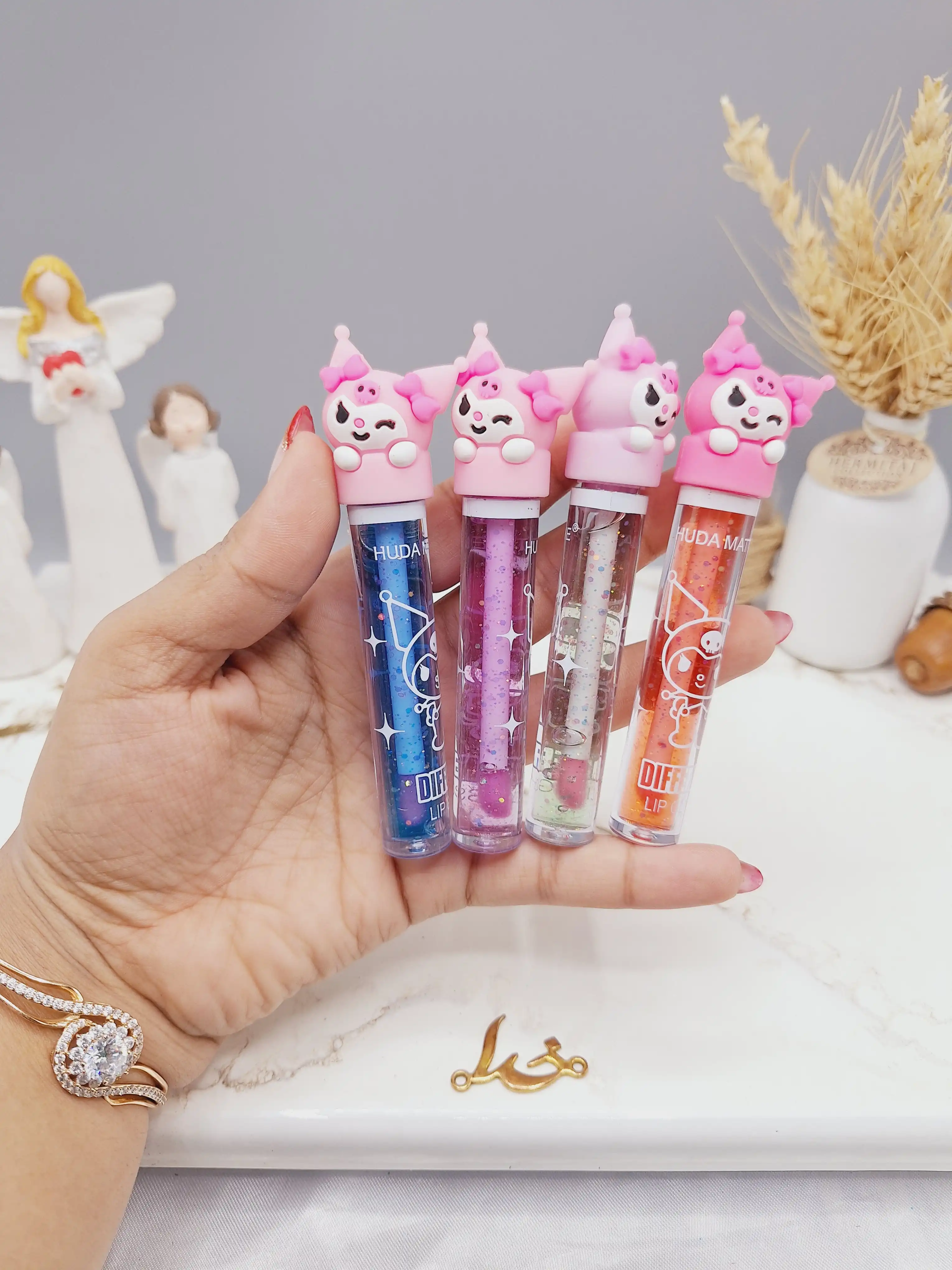 لیپ گلاس شاین دار طرح دلقک بامزه برند هدا مات می HUDA MATTE ME کد X326